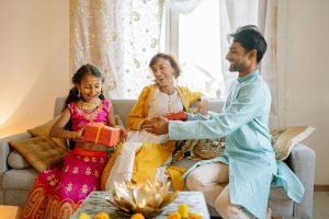 Three people sharing gifts 