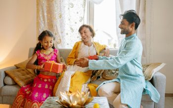 Three people sharing gifts