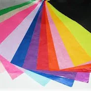 A picture of multiple overlapping sheets of multicoloured tissue paper. 